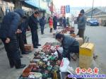 蓋州：古玩字畫一條街帶動收藏?zé)?/></a></dt>
          <a href=