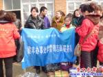 站前區(qū)怡園社區(qū)慰問倒閘溝小學(xué)貧困兒童